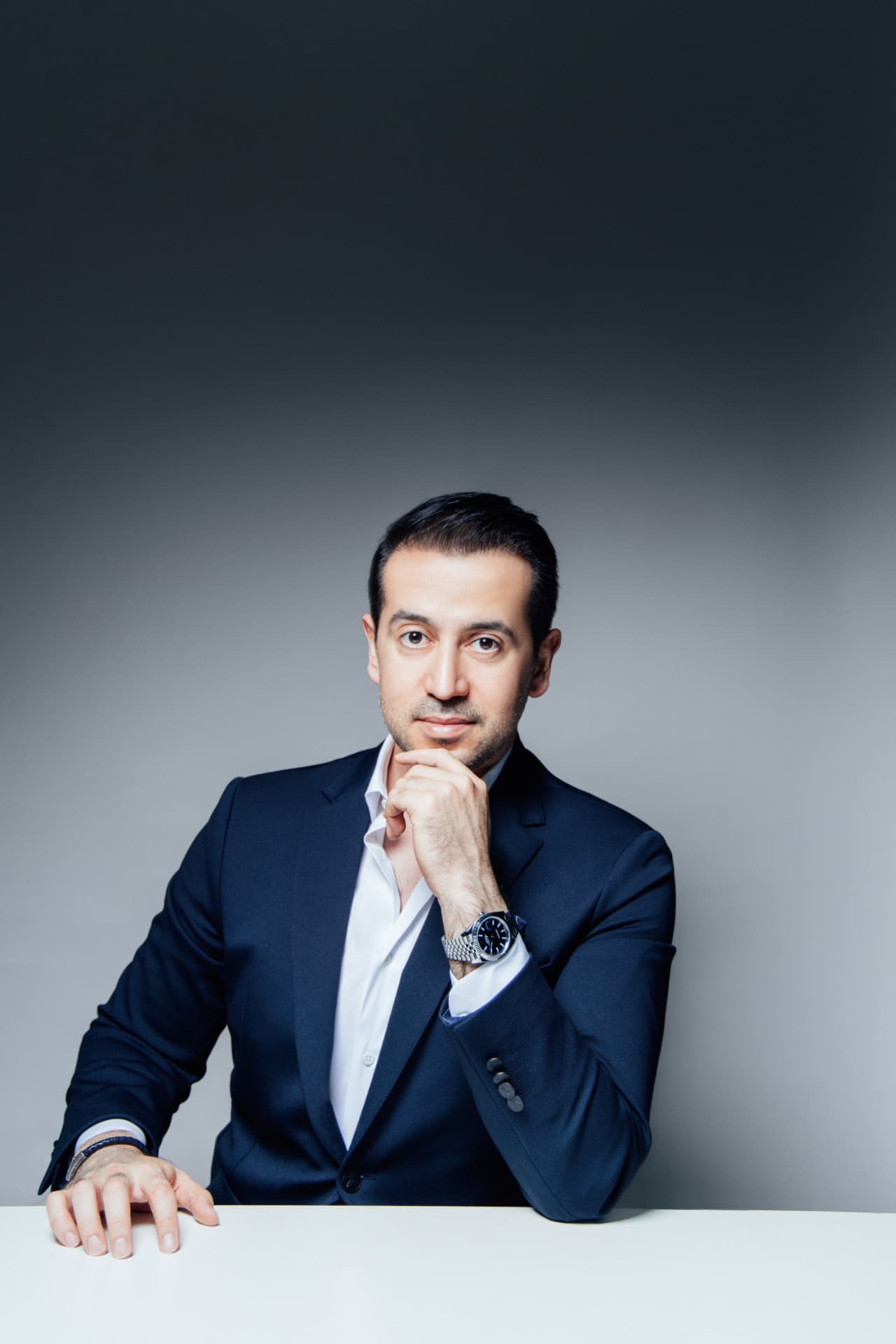 Murat Durak seated editorial portrait